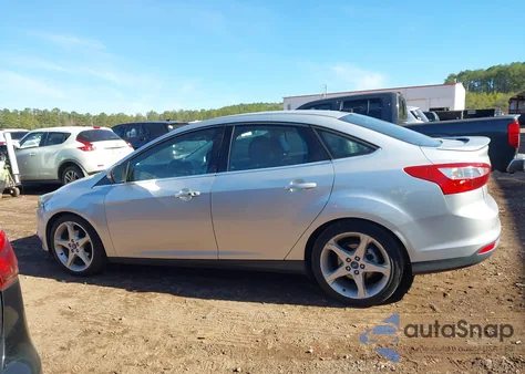 2012 Ford Focus Titanium z USA, uszkodzony, nr VIN 1FAHP3J20CL444584
